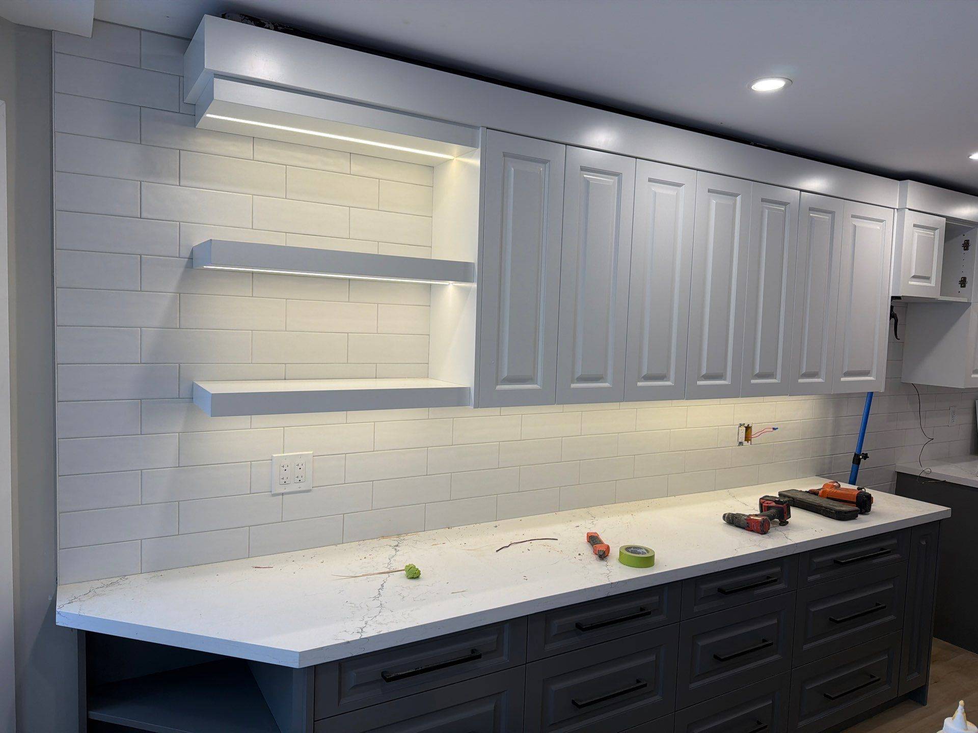 Finished kitchen, wide view with island and sink