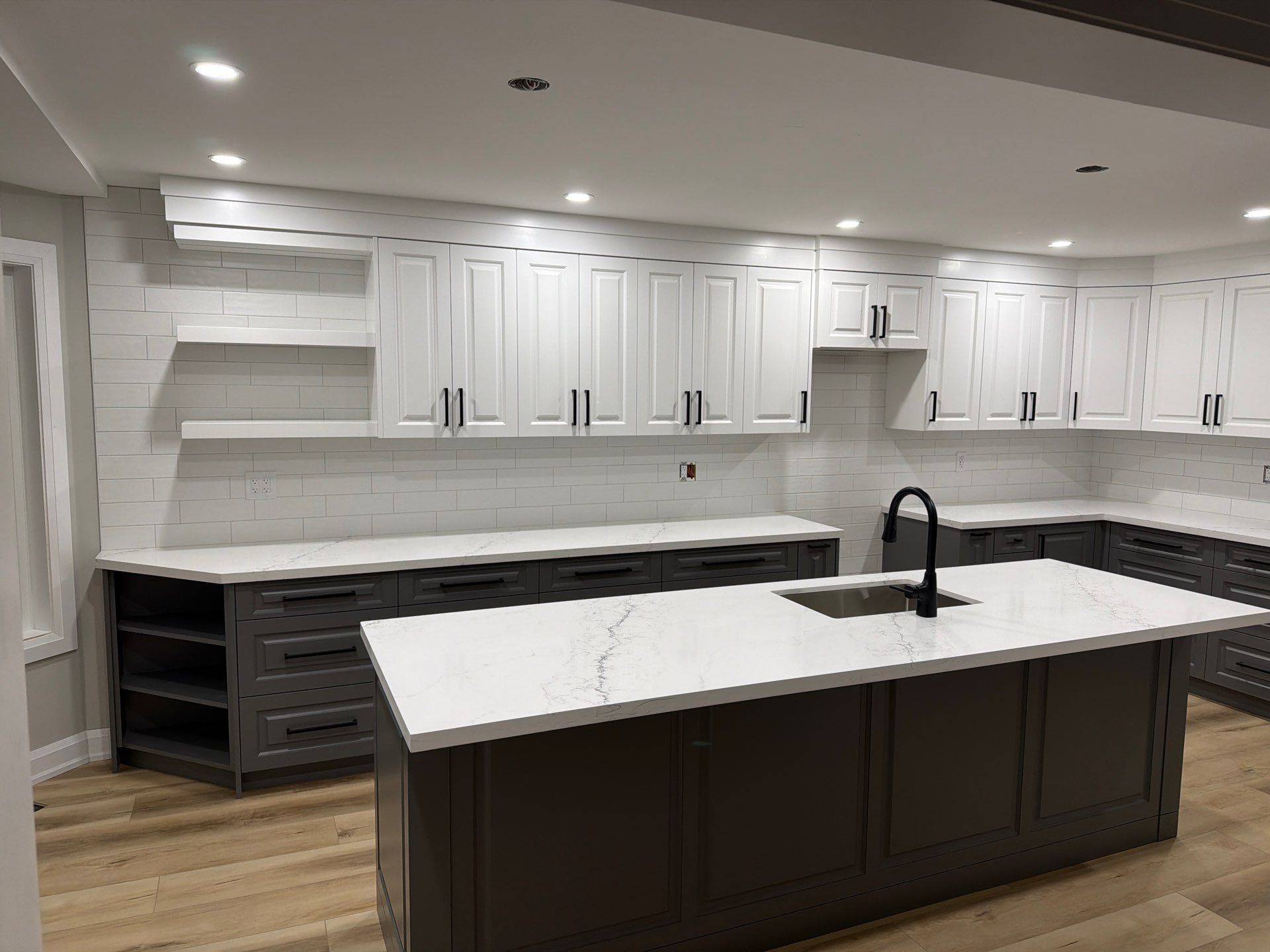 Finished kitchen with island and stools