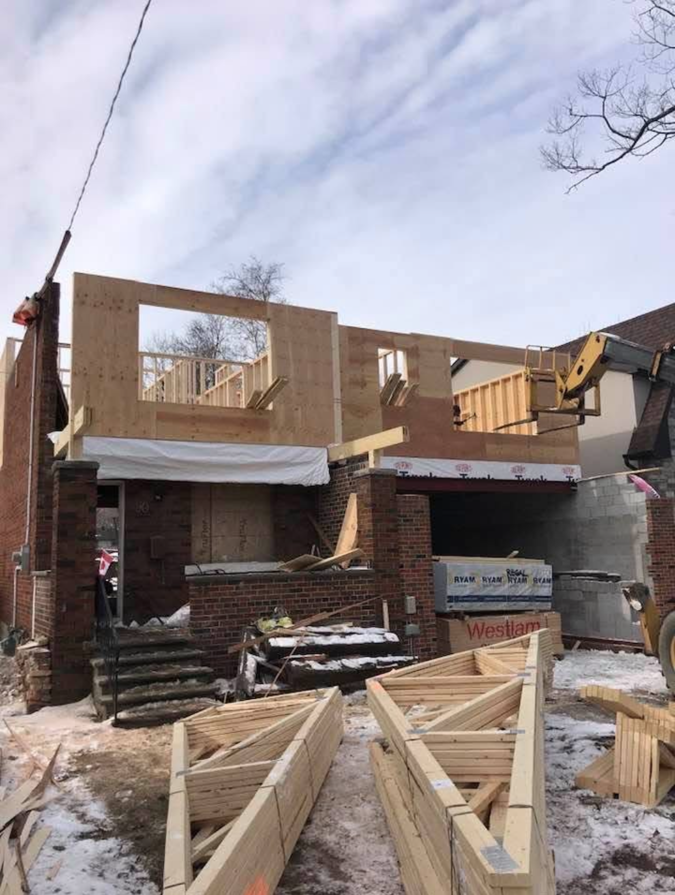 Second-storey addition framed over an existing home in Durham Region