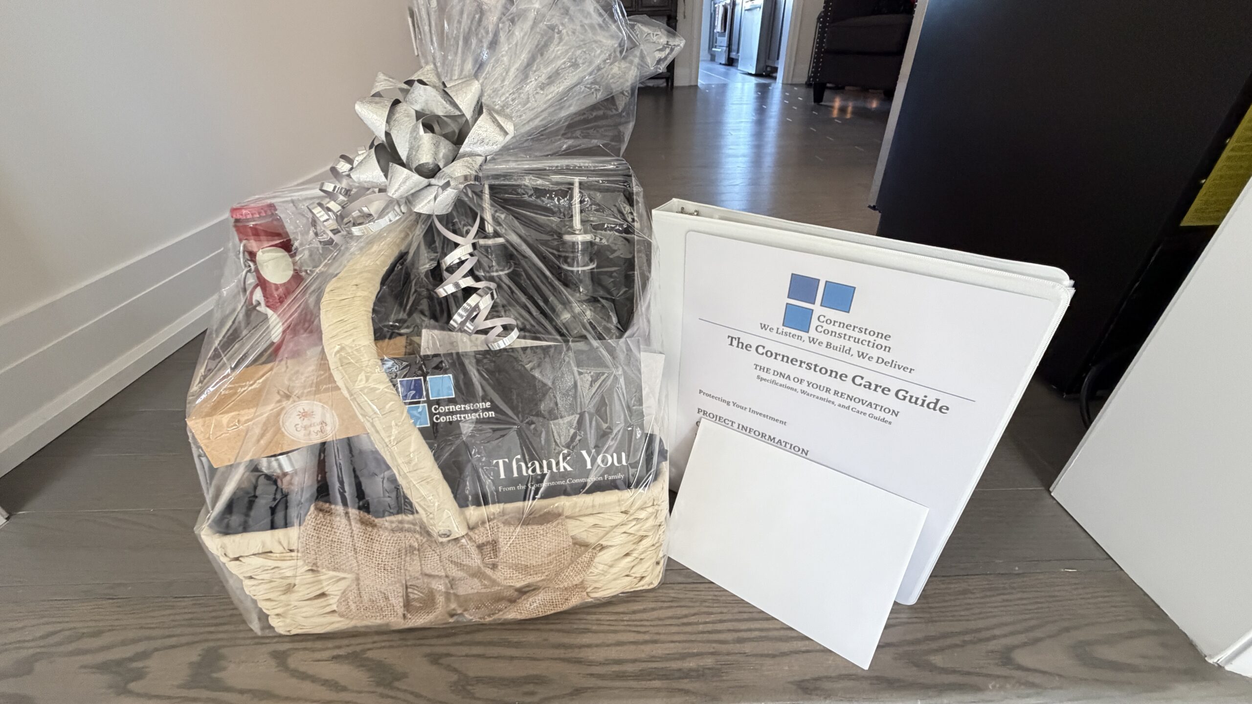 The Cornerstone Care Guide binder and thank-you gift basket