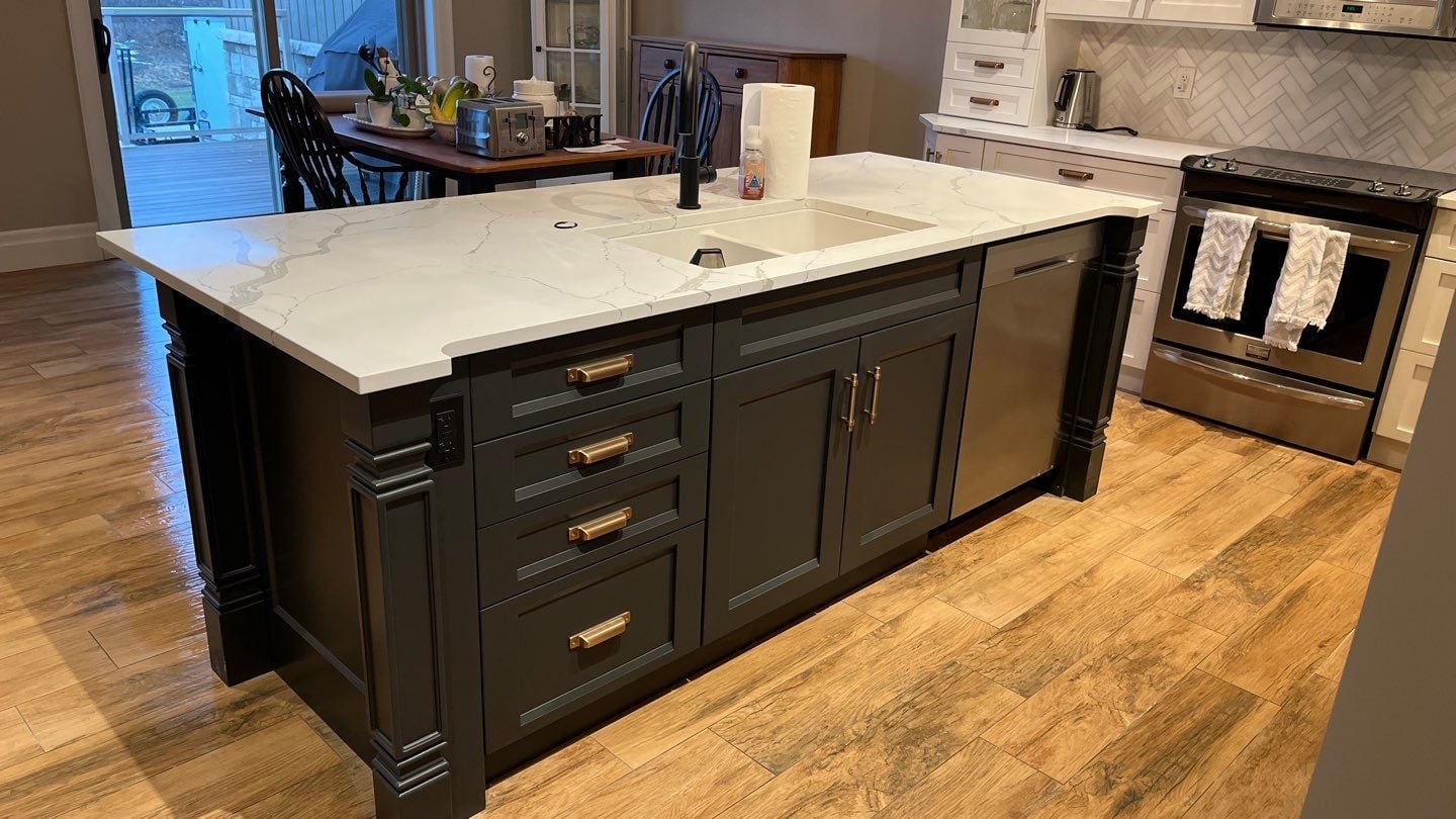 Durham Region kitchen with quartz counters and tile backsplash