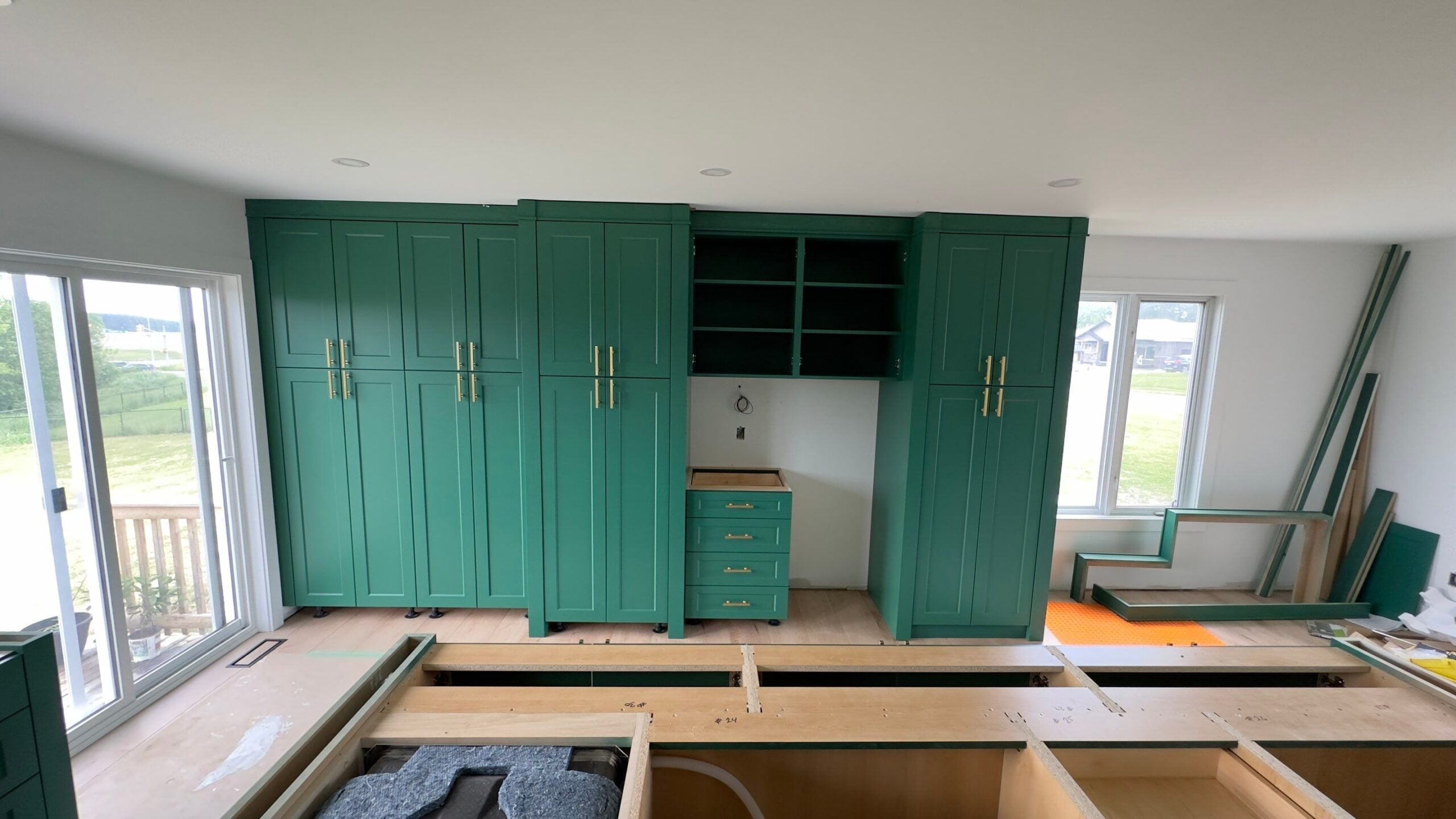 Custom cabinets being installed
