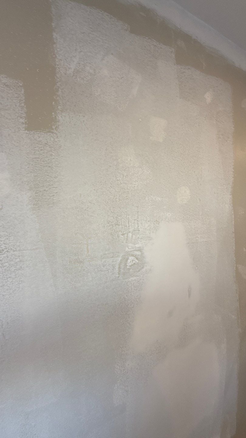 Wall skim coat in progress