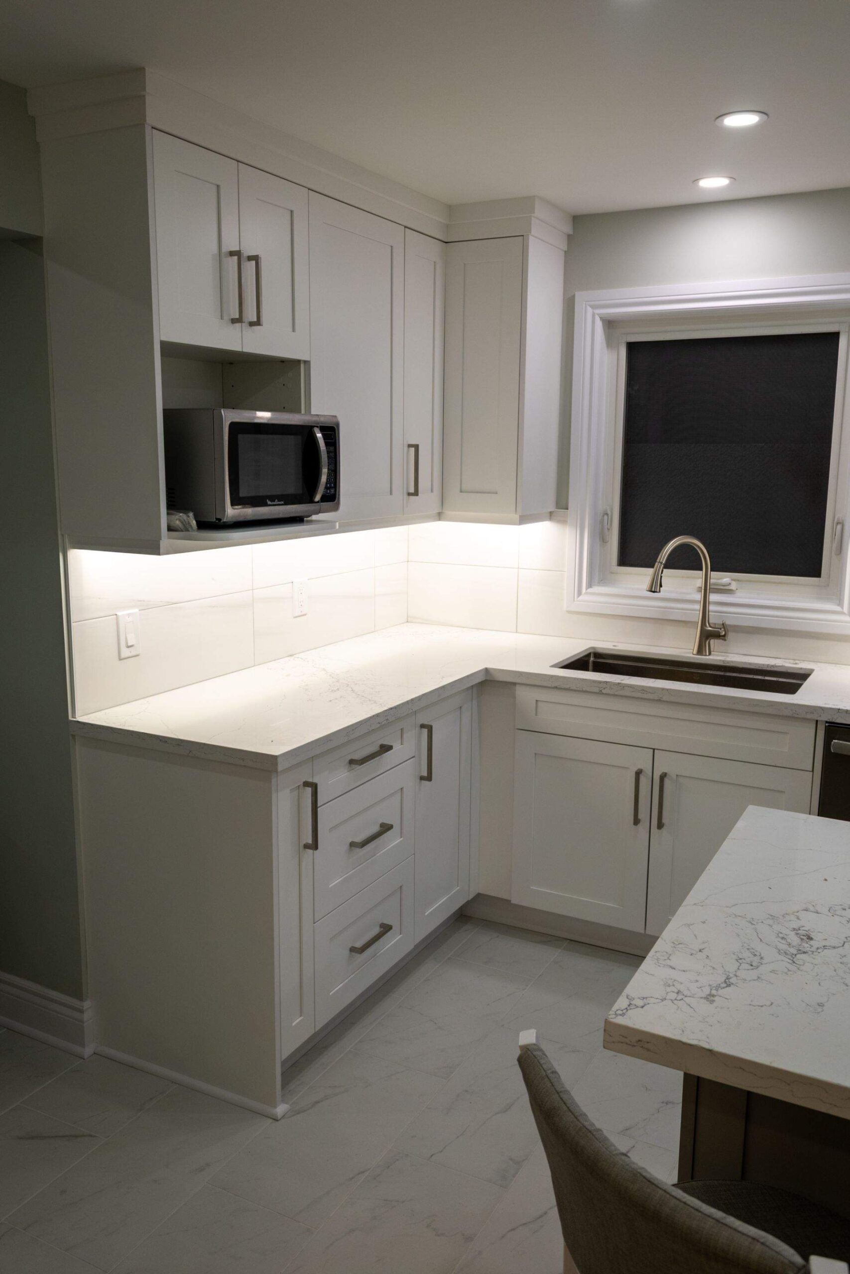 Pickering kitchen island with quartz countertop and large single sink