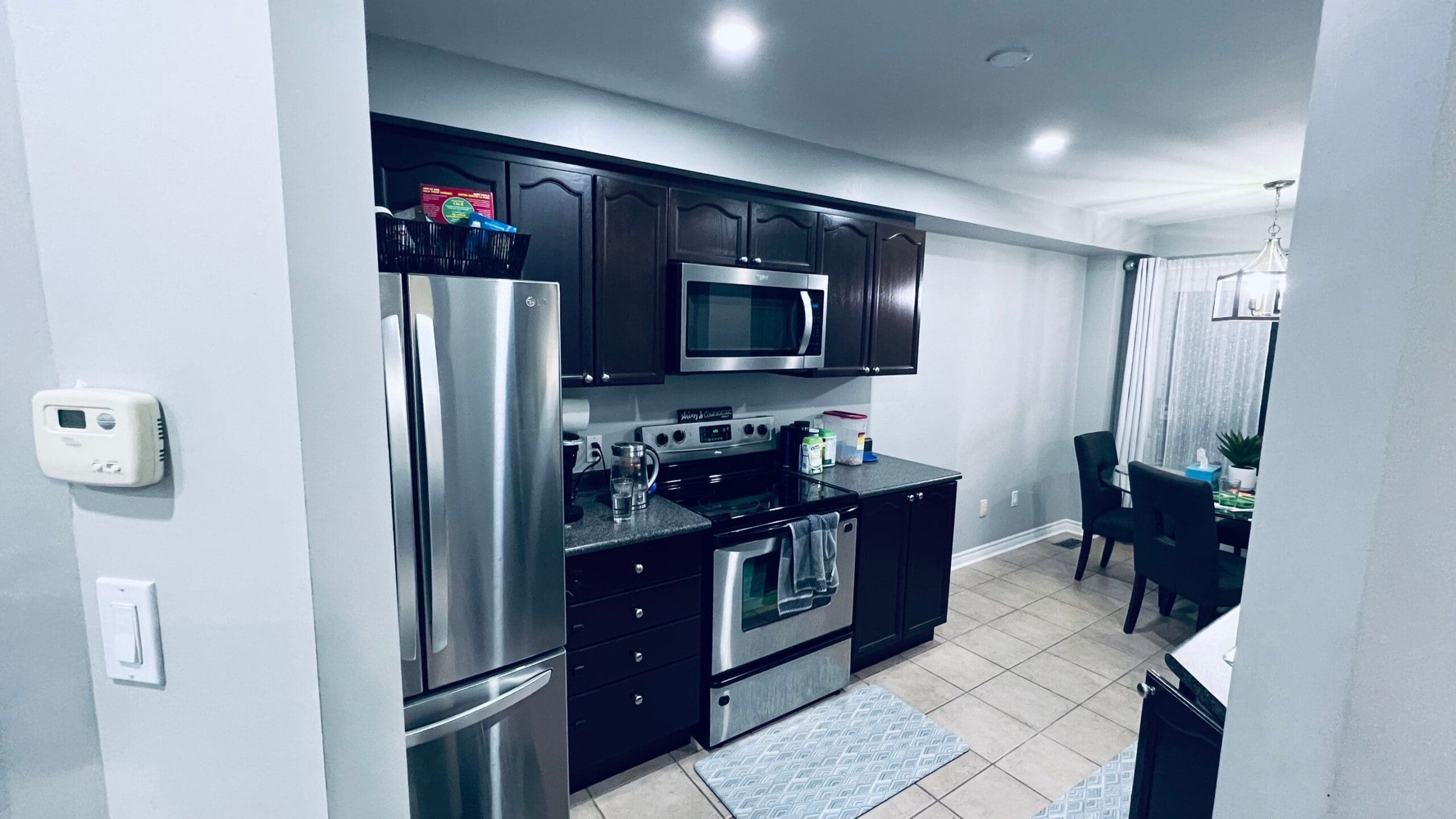 Old flooring and kitchen before the Clarington renovation