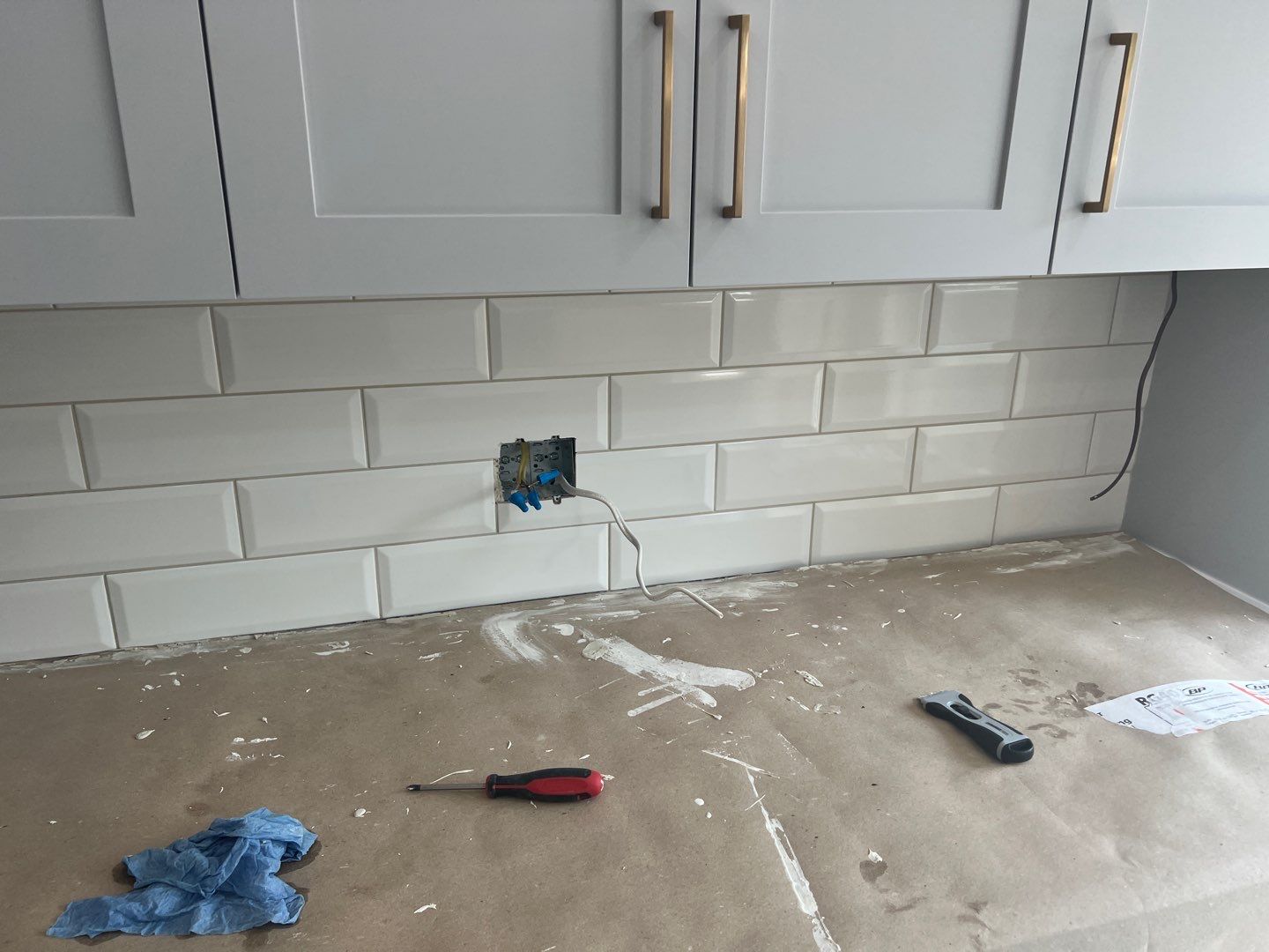 Quartz countertops and kitchen build in progress