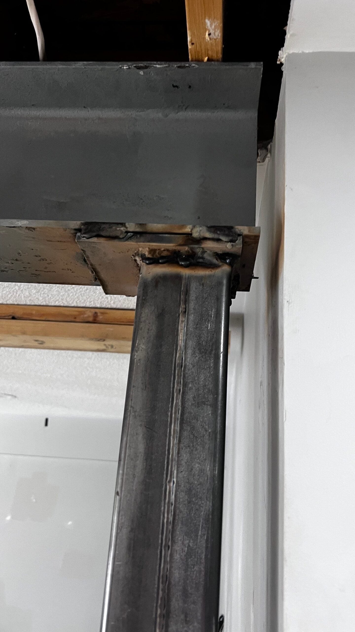 Welded steel support post carrying the new beam in the Clarington main floor