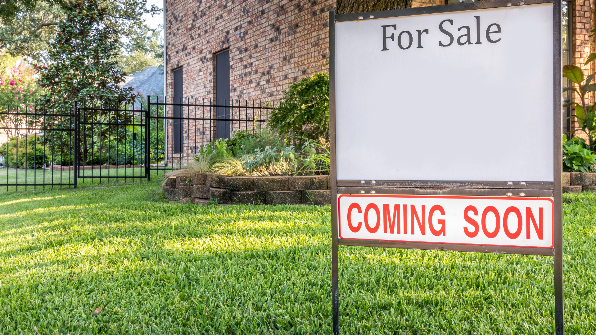 A For Sale Coming Soon sign in front of a home ready to list