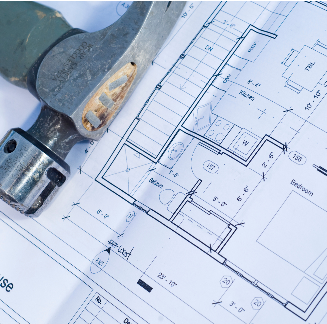 Mike Brock reviewing BCIN permit drawings